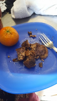Eating my lunch, hamburger patty with onions and my halo tangerine