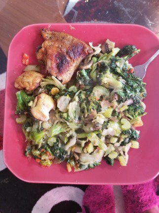Fried chicken with broccoli, kale, celery and cabbage.