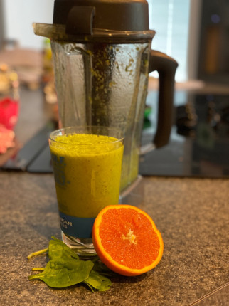 My breakfast smoothie: recipe from SimpleGreenSmoothies.com: consists of 1c of spinach, 1/2 of an or