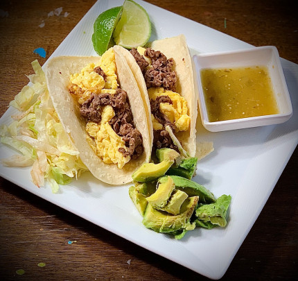 Keto friendly egg and fresh shaved steak on corn tortilla. Both eggs and steak together fit in the p