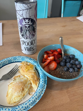 Breaking my fast @ 12 with 1/2 cup of oatmeal, 1/2 cup coconut milk, 1 purple container of fruit, 1