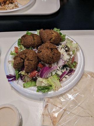 Greek salad with falafel, so good! Getting the veggies in.
