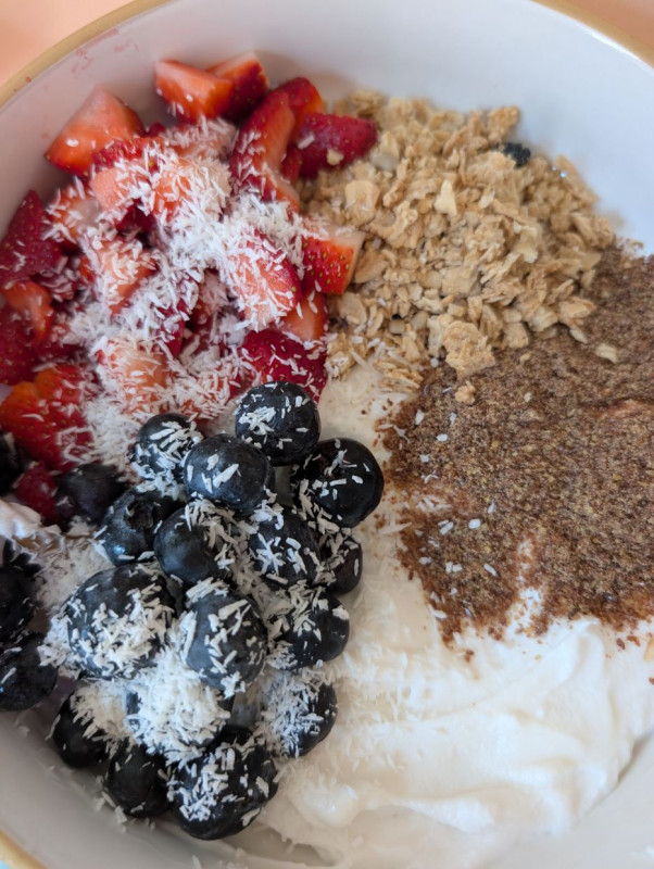 One of my favorite healthy breakfasts today - a coconut yogurt parfait with flax seeds, fruit, and m