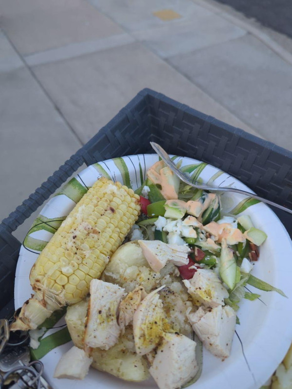 Dinner made a little cell. It had a baked potato. Put some chicken in the oven and corn on the cob