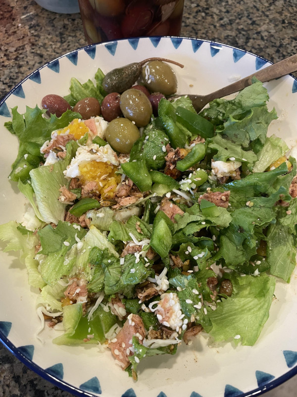 EASY lunch; can of tuna with some seasonings sprinkled in, some pepitos, chili crisps, and sesame se
