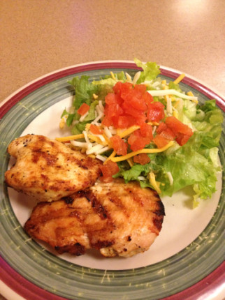 Chicken and greens... No salad dressing but a little cheese :/